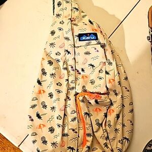 Kavu Cream Sling Bag with Orange and Green Tropical Accents